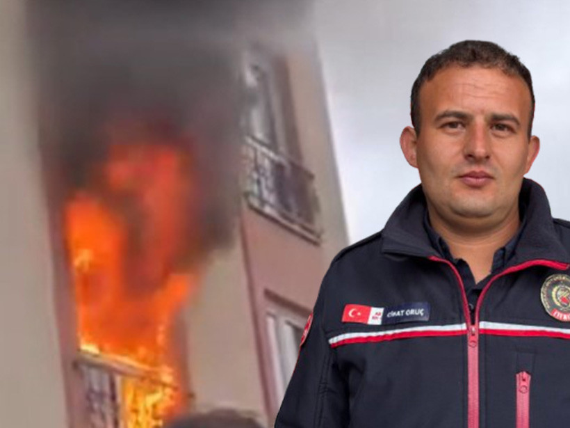 İtfaiyeci maskesini verip vatandaşı alevlerin içinden kurtardı