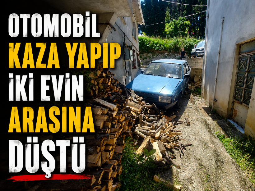 Kocaeli’de otomobil kaza yapıp iki evin arasına düştü