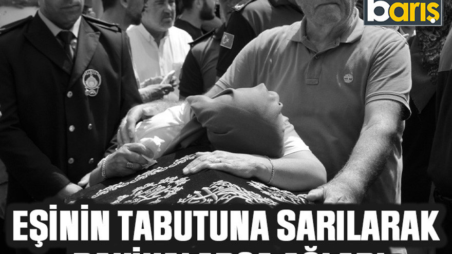 Eşinin tabutuna sarılarak dakikalarca ağladı